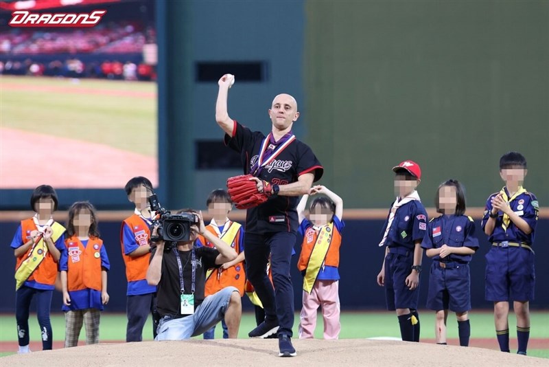 Dimitris Belbas throws the ceremonial first pitch at a Wei Chuan Dragons home game in May 2024, after being invited in recognition of his rescue efforts. Photo courtesy of Wei Chuan Dragons