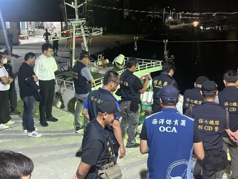 Law enforcement officers in Pingtung County search a Taiwanese long-distance fishing vessel for evidence of illegal poaching in April 2025. Photo courtesy of the Pingtung District Prosecutors Office